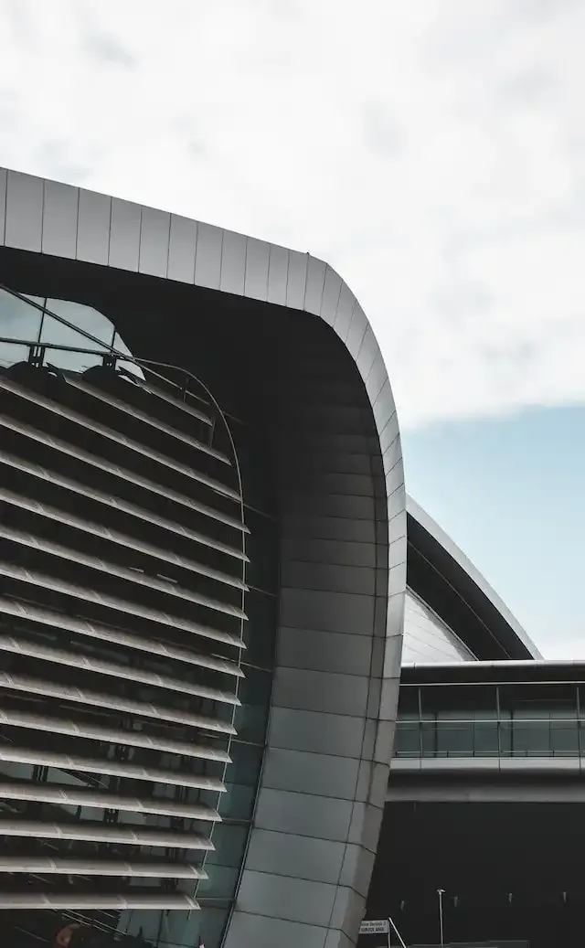 A section of an Airport building with a glass wall, illustrating the Non-Irish Resident Limited Company Registration.